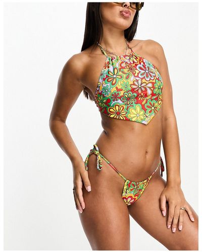 ONLY Top bikini con fondo a v allacciato al collo a fiori anni '70 - Nero