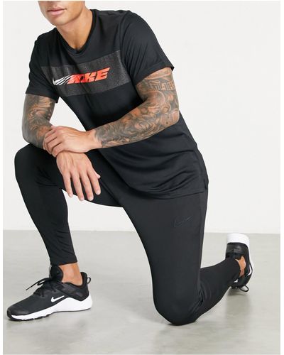Nike Football Academy - Smaltoelopende joggingbroek - Zwart