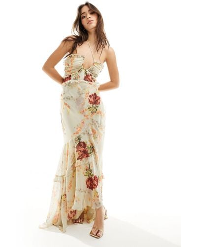 ASOS Vestido largo color crema con bajo asimétrico, estampado floral, cuello halter y volantes - Metálico