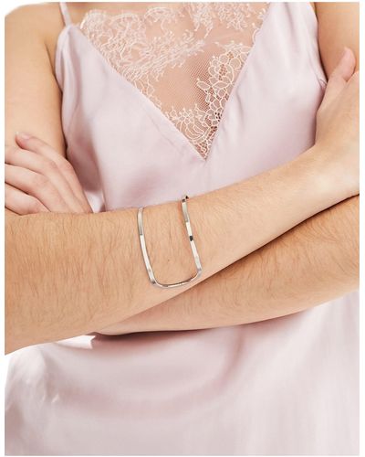 ASOS Bracciale rigido a fascia argentato con design cut-out - Rosa