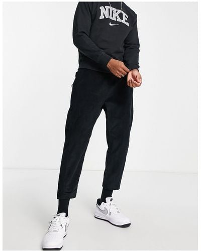 Nike Pantalon court fuselé en velours côtelé - Noir