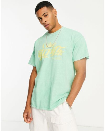 River Island Camiseta lavado con estampado "coke" - Verde