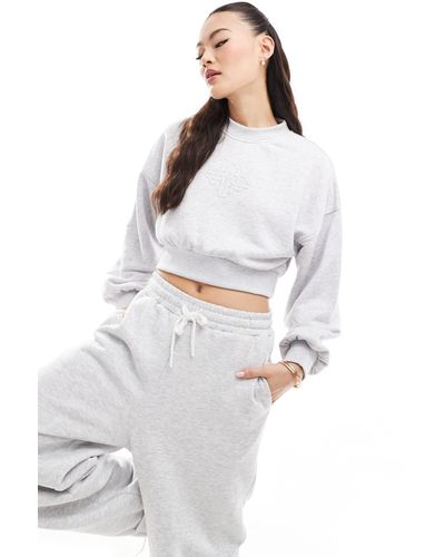 The Couture Club Cropped Emblem Sweatshirt - White