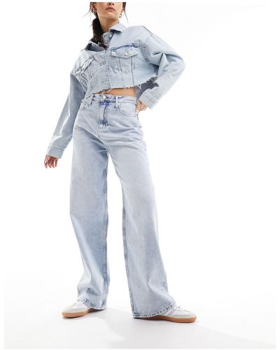 Calvin Klein Jeans comodi a vita alta lavaggio chiaro - Blu