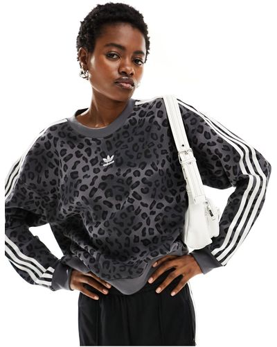 adidas Originals – leopard luxe – sweatshirt - Schwarz
