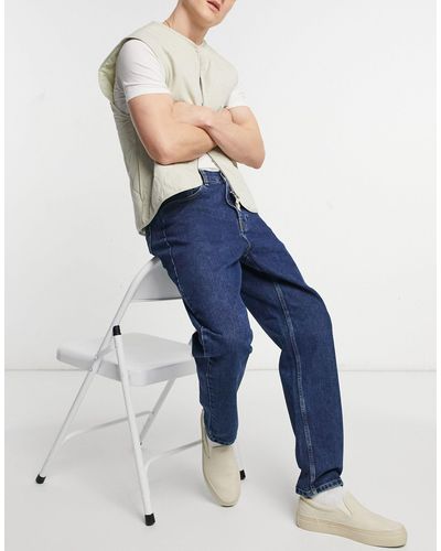 Carhartt Newel - Ruimvallende Jeans Met Toelopende Pasvorm - Blauw