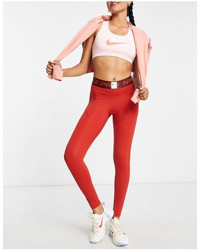 Nike Pro - legging à taille mi-haute en tissu dri-fit - Rouge