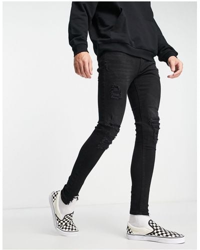 ADPT Superstrakke Skinny Jeans Met Grote Scheuren - Zwart