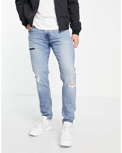 Levi's 512 - Smalle Toelopende Distressed Jeans - Blauw