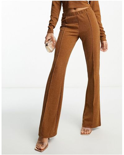Pieces Pantaloni a zampa a vita alta color ruggine glitterato - Arancione
