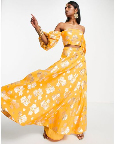ASOS Falda larga color estilo lehenga con diseño floral - Amarillo