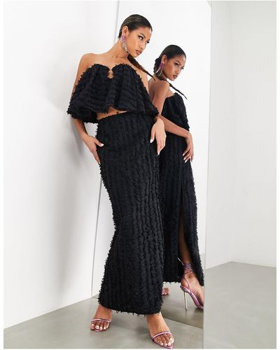 ASOS Falda midi negra texturizada con abertura hasta el muslo - Negro