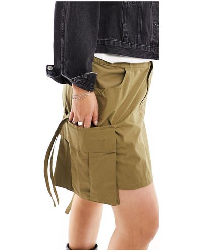 Collusion Plus Utility Mini Skirt With Drop Pocket And Tab Detail - Black