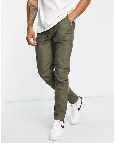 TOPMAN Pantaloni skinny color kaki con vita elasticizzata - Verde