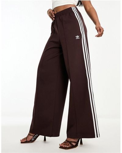 Pantalones anchos adidas new arrivals