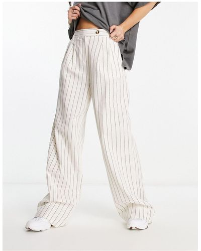 Bershka Pantalon ample en lin à taille haute et rayures - écru - Blanc