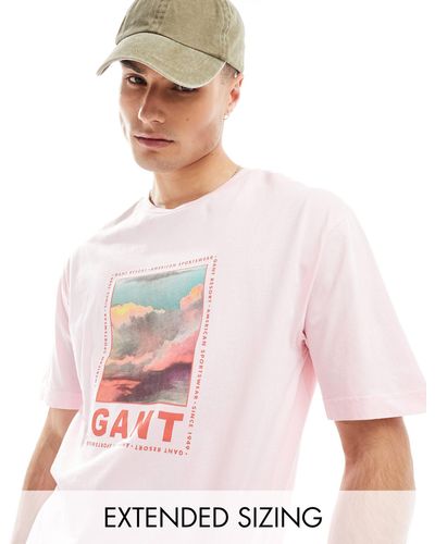 GANT T-shirt comoda con stampa del logo e di nuvole slavata davanti - Rosa