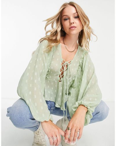 ASOS Dobby Long Sleeve Blouse With Lace Up Front & Peplum Hem - Green