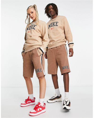Nike Pantalones cortos marrón antiguo unisex con logo universitario retro