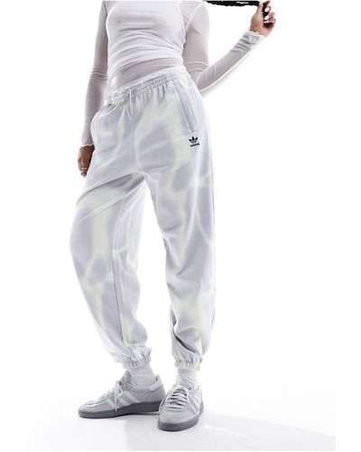adidas Originals Dye Allover Print joggers - White