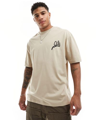 ASOS T-shirt oversize à inscription sur la poitrine - beige - Neutre