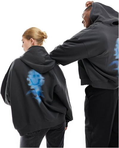 Weekday Sudadera negro desgastado unisex con capucha, cremallera y estampado gráfico - Azul