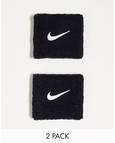 Nike Muñequeras negras unisex con logo - Negro