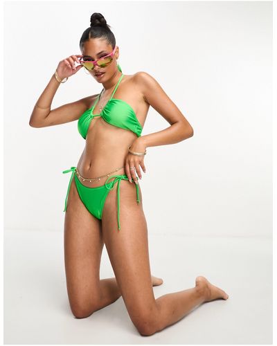 Pieces Esclusiva - slip bikini sgambati acceso con allacciatura laterale - Verde