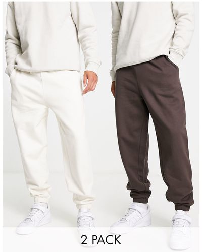 ASOS Confezione da 2 joggers oversize marrone scuro/bianco tenue - Multicolore