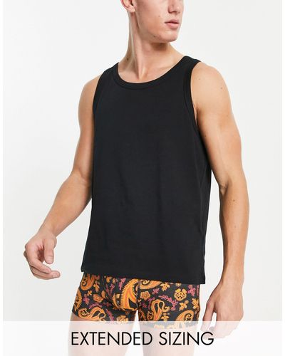 ASOS – pyjama, bestehend aus trägertop und engen boxershorts - Schwarz