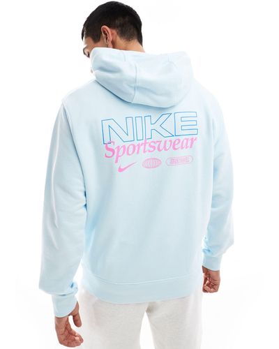 Nike Sudadera claro con capucha y estampado gráfico en la espalda - Azul