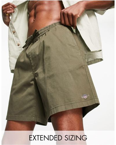 GANT Pantaloncini scuro con coulisse e logo - Verde