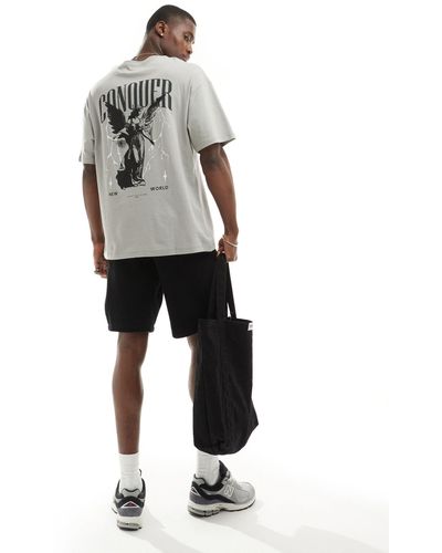 ADPT T-shirt oversize grigia con stampa di angelo "conquer" sul retro - Grigio