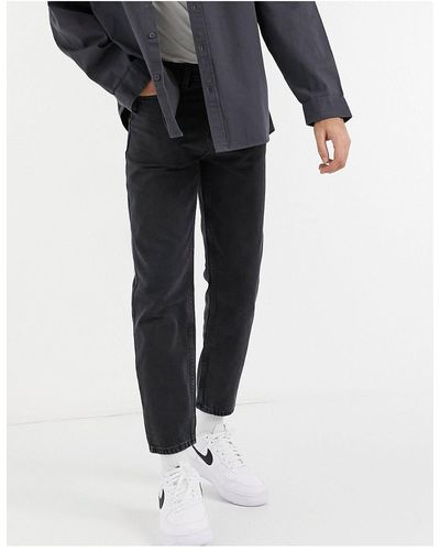 New Look Jean coupe slim rigide - délavé - Noir
