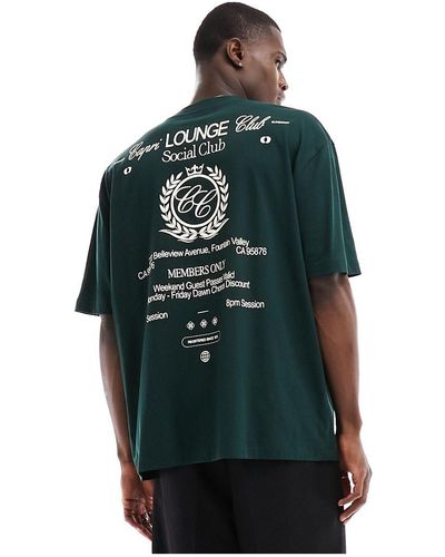 ASOS T-shirt oversize avec imprimé devant et au dos - foncé - Noir
