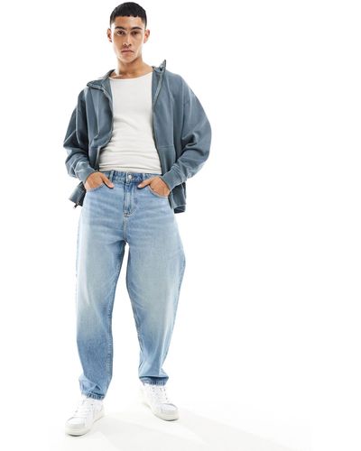 ASOS Jeans oversize affusolati lavaggio medio - Blu