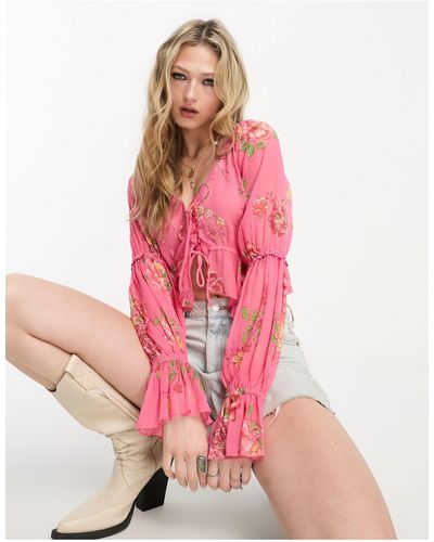 Reclaimed (vintage) – bluse mit geschnürter vorderseite und rosa blumenmuster - Pink
