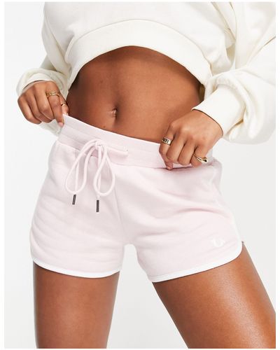 True Religion Pantaloncini della tuta rosa pallido con logo floccato - Bianco