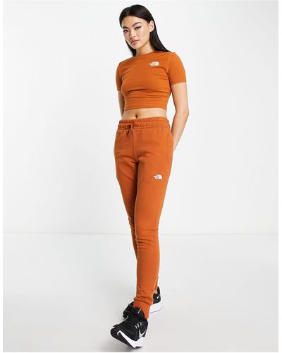 The North Face – eng geschnittene jogginghose - Orange