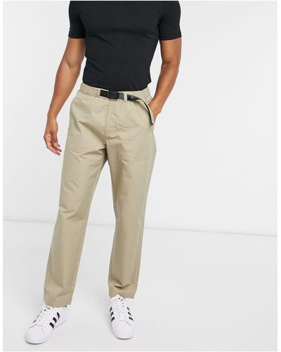 Levi's Pantalones estilo borceguíes en beis con cinturón - Neutro