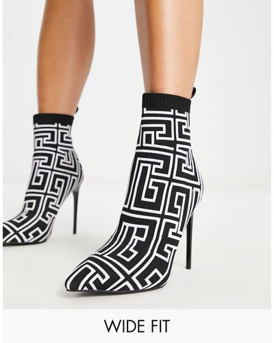 SIMMI Simmi London - Anusha - Sock Boots Met Brede Pasvorm, Stilettohak En Print - Zwart