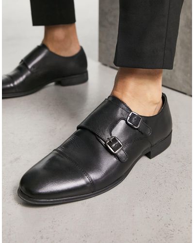 Schuh – ross – monk-e aus schwarzem leder