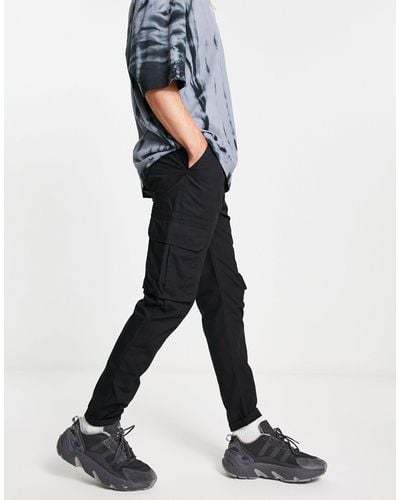 New Look Pantalon cargo classique en tissu indéchirable - Noir