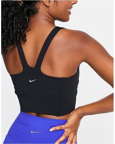 Nike Nike - yoga luxe - crop top senza maniche - Blu