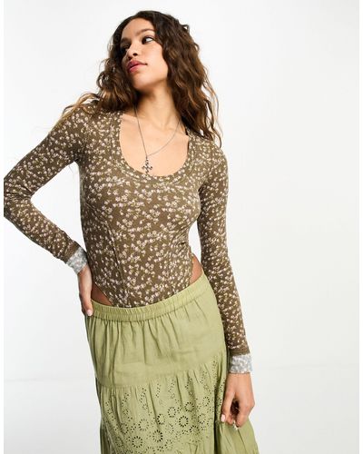 Free People Body a fiorellini verde a coste