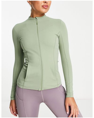 Nike Nike - yoga luxe dri-fit - giacca aderente salvia con zip - Verde