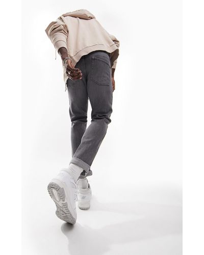 ASOS – schmal geschnittene stretch-jeans aus selvedge-denim - Grau
