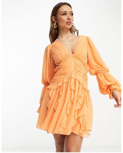ASOS Ruched Waist Plunge Mini Dress With Ruffle Skirt And Open Back Detail - Orange