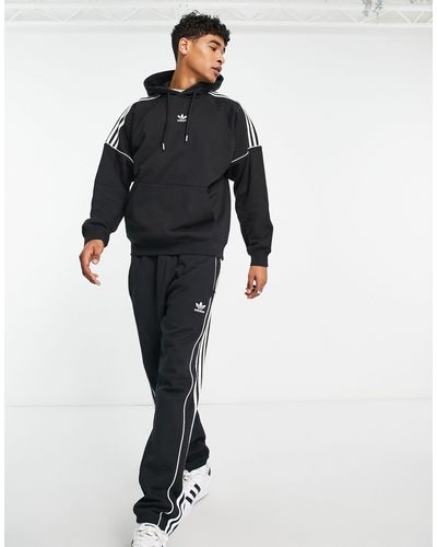 adidas Originals Rekive - Trainingsbroek Met 3-strepen Logo - Zwart