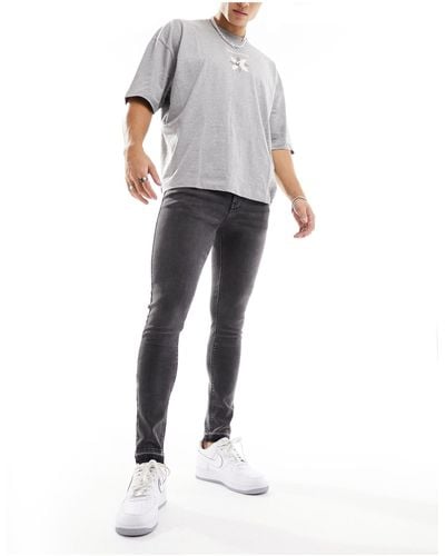 ASOS Spray On Jeans With Power Stretch And Released Hem - White